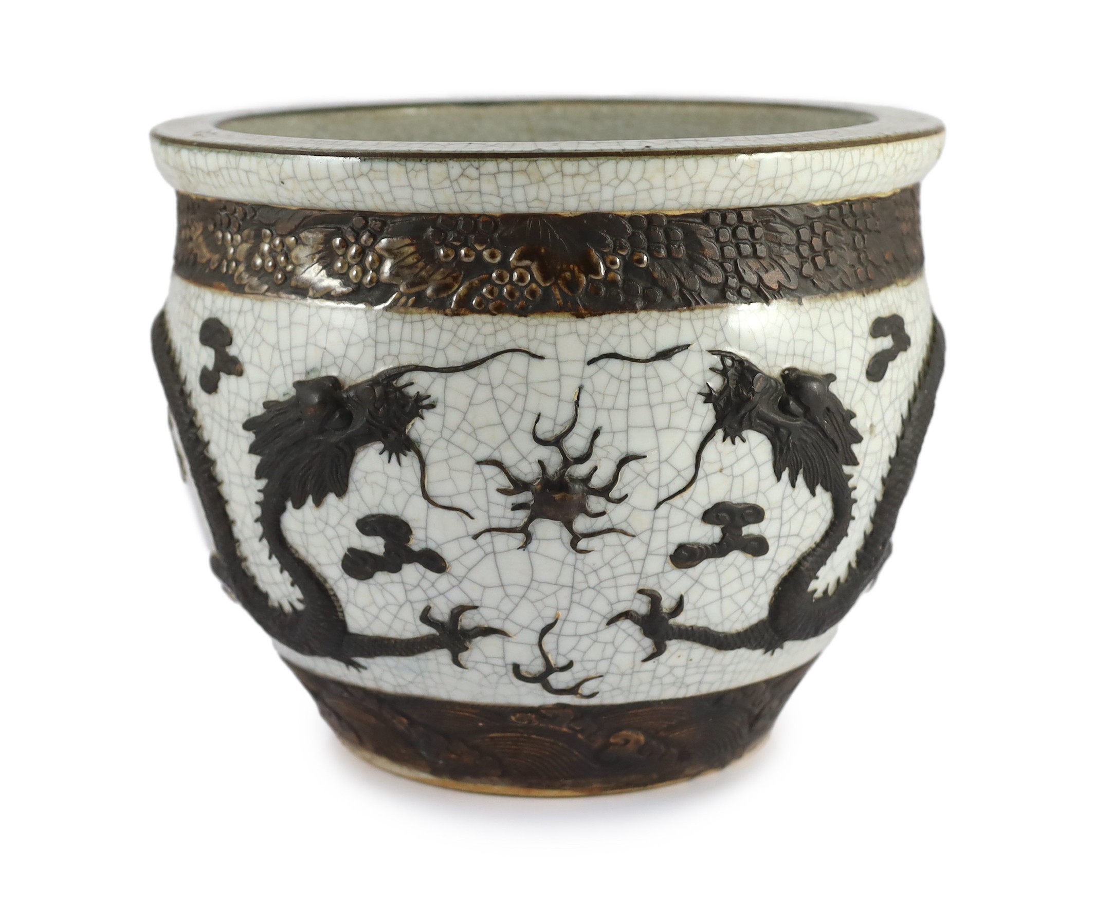 A Chinese crackle glaze 'dragon' jardiniere, late 19th century, 31.6cm diameter, 25.5cm high, star crack to base